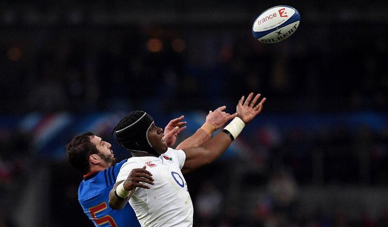 England’s lock Maro Itoje (R) and France’s lock Yoann Maestri jump for the ball  during the Six Nations international rugby union match between France and England at the Stade de France in Saint-Denis, north of Paris, on March 19, 2016. AFP PHOTO / FRANCK FIFE