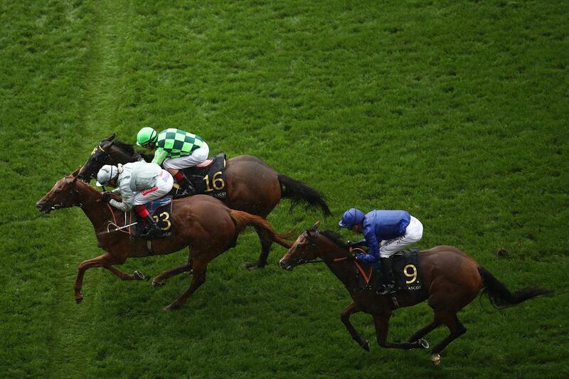 Frankie Dettori, riding Raffle Prize, crosses the finish line to win The Queen Mary Stakes. Getty Images