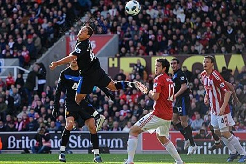 Manchester United’s Javier Hernandez uses his initiative to open the scoring against Stoke City at Britannia Stadium.   The Mexican grabbed his fifth goal for United later in the game to secure the win.