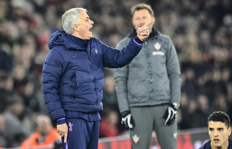 Tottenham Hotspur's Portuguese head coach Jose Mourinho (L) gestures to the referee following a foul on a player during the English FA Cup fourth round football match between Southampton and Tottenham Hotspur at St Mary's Stadium in Southampton, southern England on January 25, 2020. (Photo by Glyn KIRK / AFP) / RESTRICTED TO EDITORIAL USE. No use with unauthorized audio, video, data, fixture lists, club/league logos or 'live' services. Online in-match use limited to 120 images. An additional 40 images may be used in extra time. No video emulation. Social media in-match use limited to 120 images. An additional 40 images may be used in extra time. No use in betting publications, games or single club/league/player publications. / 