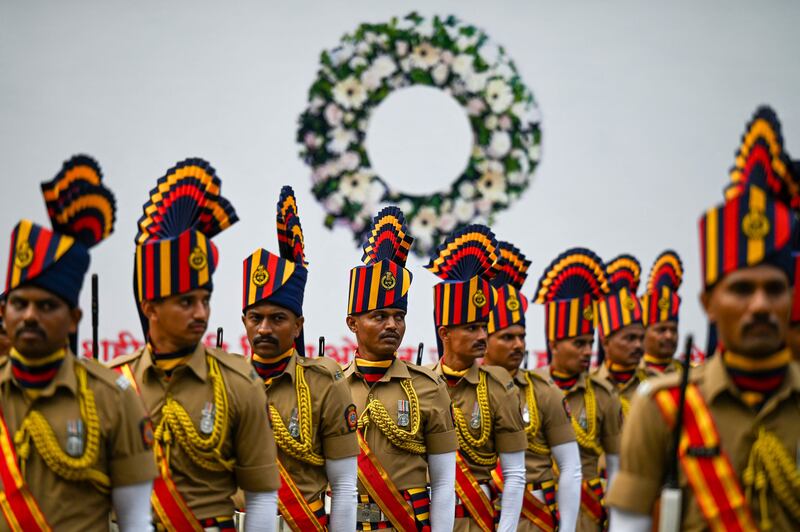 Officers in ceremonial attire pay their respects at the Police Memorial in Mumbai on the 15th anniversary of the 2008 terrorist attacks on the city. AFP