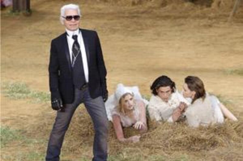The designer Karl Lagerfeld makes an appearance at the Chanel catwalk show at Paris Fashion Week.