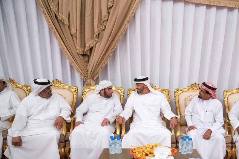 BANIYAS, ABU DHABI, UNITED ARAB EMIRATES - September 15, 2019: HH Sheikh Mohamed bin Zayed Al Nahyan, Crown Prince of Abu Dhabi and Deputy Supreme Commander of the UAE Armed Forces (2nd R), offers condolences to the family of martyr Warrant Officer Saleh Hassan Saleh bin Amro.

( Hamad Al Kaabi / Ministry of Presidential Affairs )​
---
