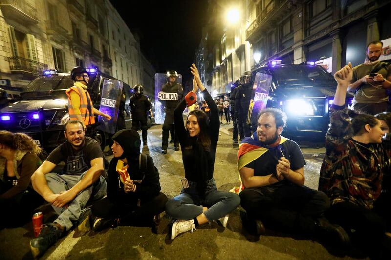 Demonstrators attend a rally, after a verdict in a trial over a banned independence referendum, in Barcelona, Spain. Reuters