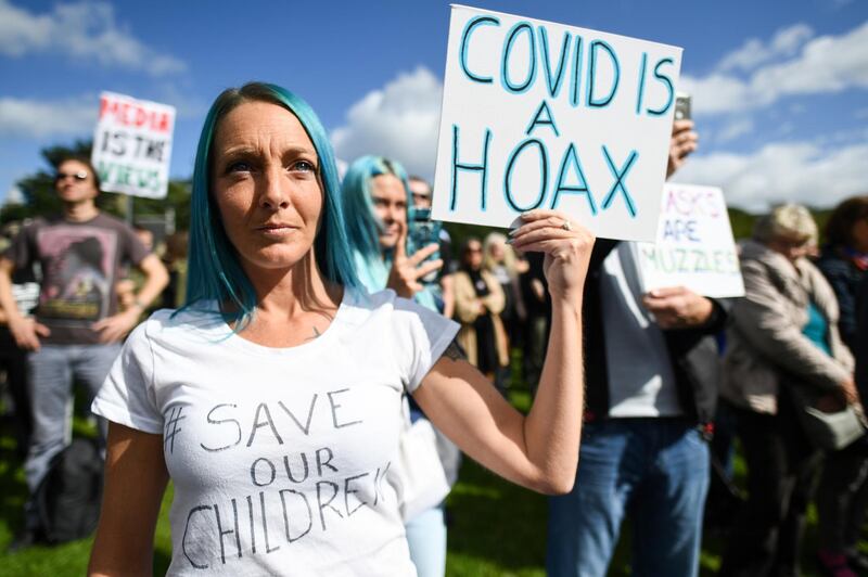 Protestors gather near the Scottish Parliament to demonstrate against a secondary lockdown. Getty Images