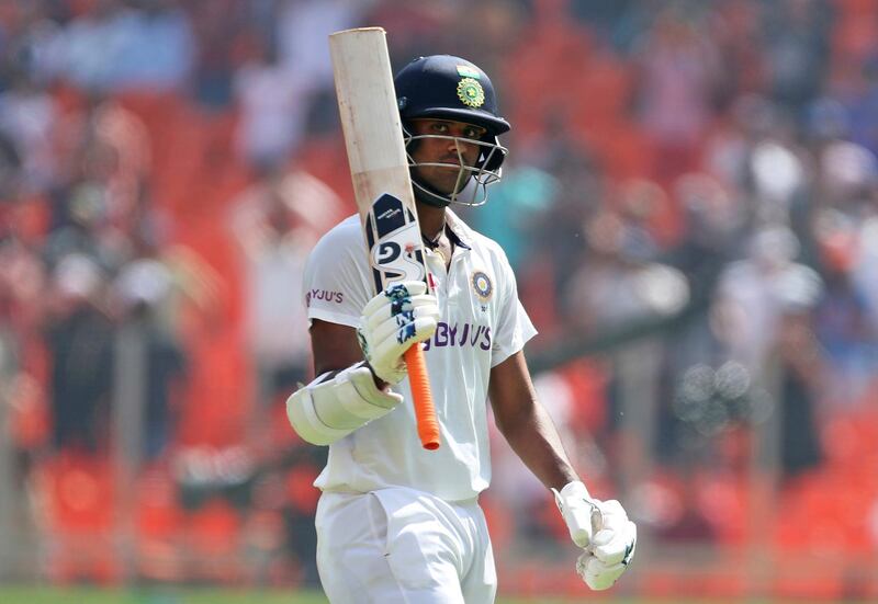 India's Washington Sundar raises his bat as he walks off the field after remaining unbeaten on 96 during the third day of fourth Test. AP