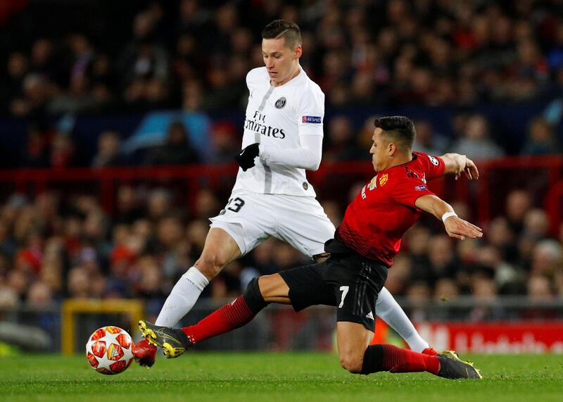 Soccer Football - Champions League Round of 16 First Leg - Manchester United v Paris St Germain - Old Trafford, Manchester, Britain - February 12, 2019  Paris St Germain's Julian Draxler in action with Manchester United's Alexis Sanchez    REUTERS/Phil Noble