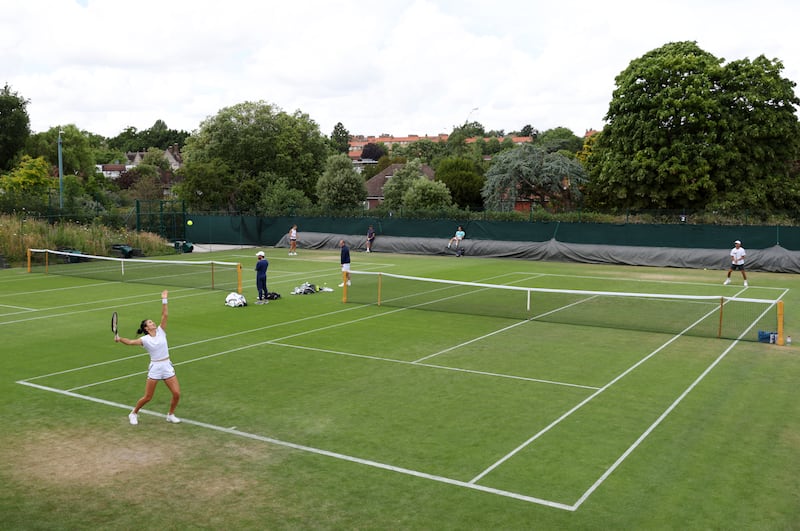 Emma Raducanu serves during their training session ahead of The Championships Wimbledon 2022. Getty Images