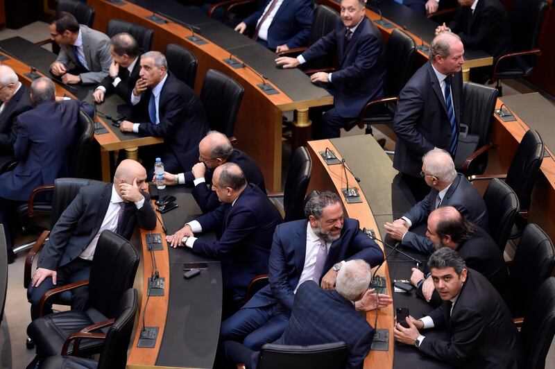 Lebanese MPs speak to each other prior to the start of a parliament session to elect a new Lebanese president, in Beirut, Lebanon, on November 10. EPA