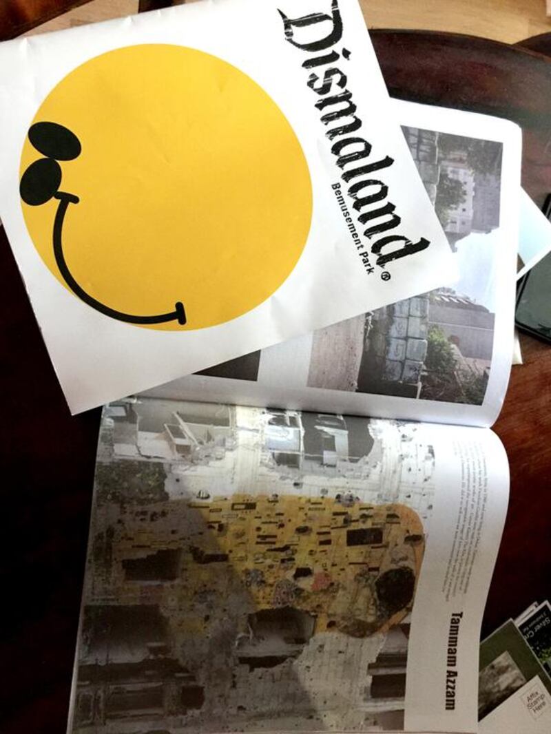 Tammam Azzam’s artwork in the Dismaland catalogue, part of Banksy’s new pop-up exhibition in the UK. Courtesy Ayyam Gallery