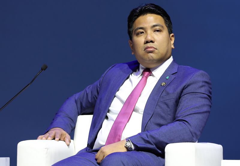 Tengku Muhammad Taufik, president and chief executive of Petronas, during a panel discussion on 'The New Business and Energy Portfolio Model: Managing Geopolitical Uncertainty and the Energy Transition' at Adipec 2022. Chris Whiteoak / The National