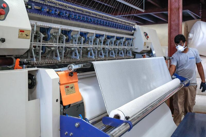 The state-of-the-art quilting machine at Intercoil’s factory was imported from Germany. Victor Besa for The National