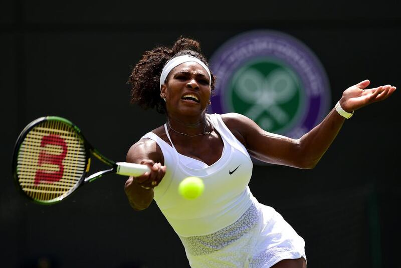 Serena Williams of the United States hits a forehand in her first round match against Margarita Gasparyan of Russia during Day 1 of Wimbledon at the All England Club on June 29, 2015 in London, England.  (Photo by Shaun Botterill/Getty Images)