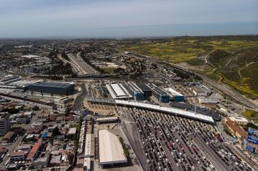 Cars waited to cross the San Ysidro Port of Entry border crossing that connects the US-Mexico border cities of San Diejo and Tijuana. AFP