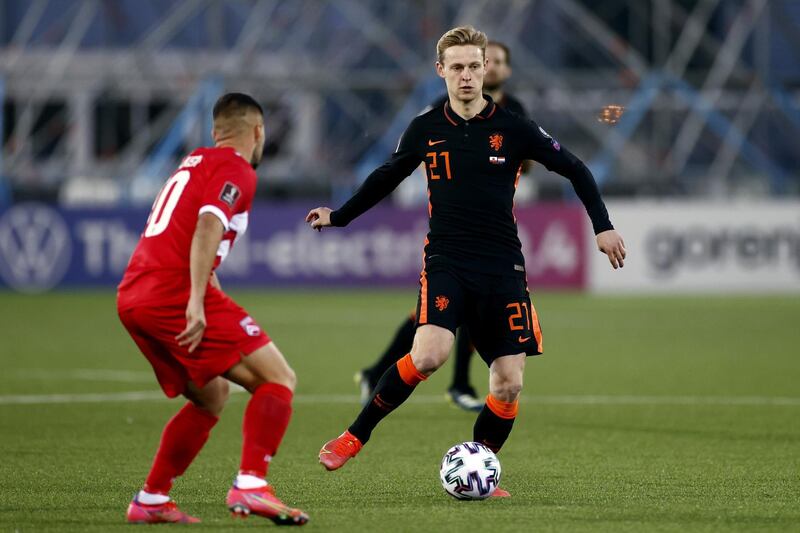 GIBRALTAR - (lr) Liam Walker of Gibraltar, Frenkie de Jong of Holland during the World Cup qualifying match between Gibraltar and the Netherlands at the Victoria Stadium on March 30, 2021 in Gibraltar, Gibraltar. ANP KOEN VAN WEEL (Photo by ANP Sport via Getty Images)