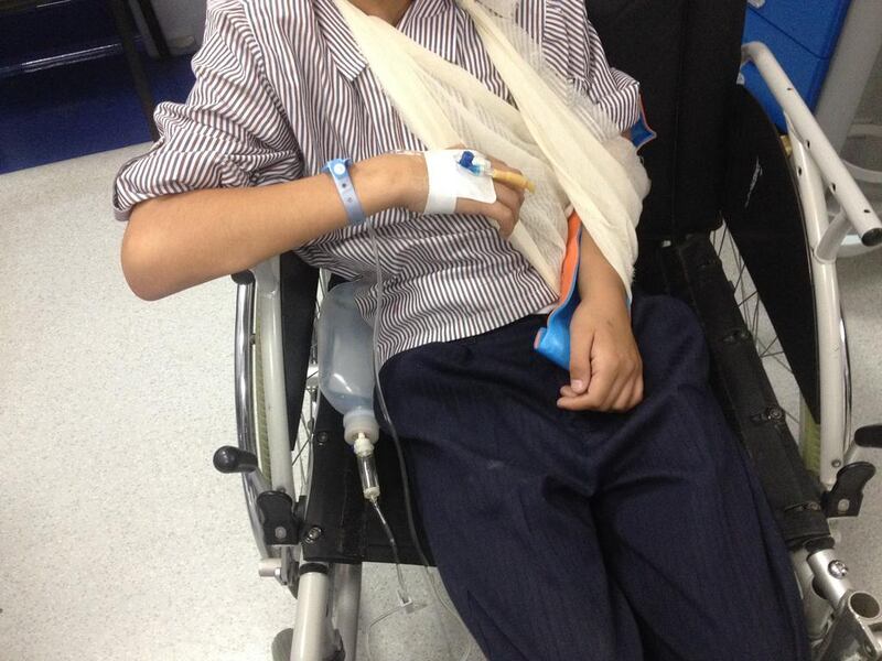 A boy with a broken arm at the Sheikh Rashid Hospital. Jaime Puebla / The National 