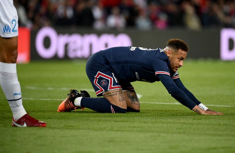 Paris Saint-Germain's Brazilian forward Neymar reacts after being fouled. AFP