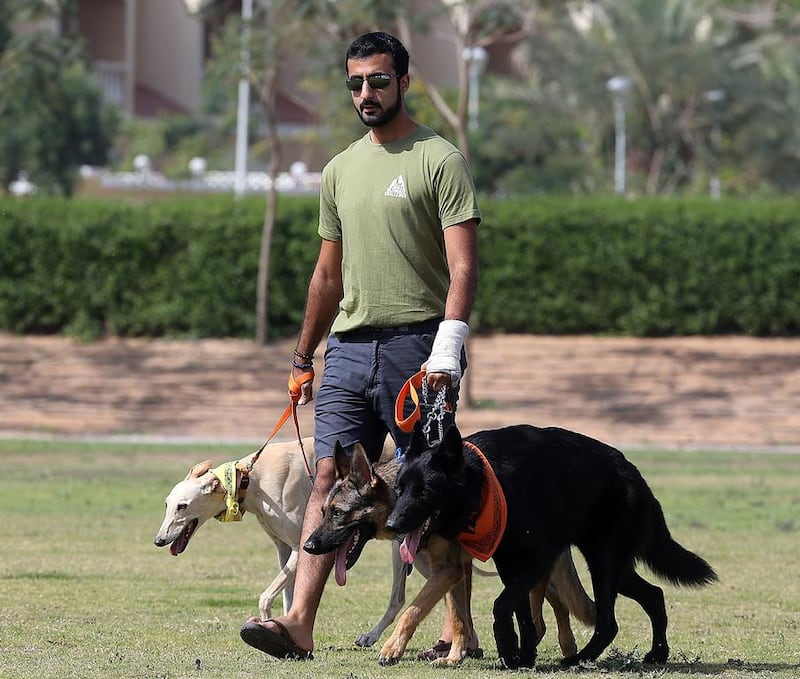Hussain Darwish, organiser of the K9 Challenge, with his own dogs in Dubai. Satish Kumar / The National
