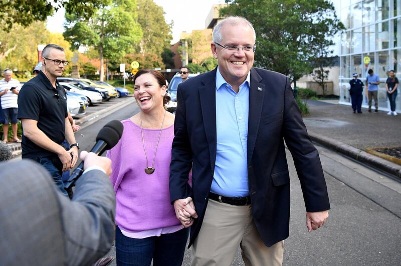 epa07583269 Prime Minister Scott Morrison and wife Jenny speak to the media as they arrive at the Horizon Church in Sydney, Australia, 19 May, 2019. Morrison's Liberal party government, with 59.2 per cent of the vote counted, has one the Australian federal election.  EPA/JOEL CARRETT  AUSTRALIA AND NEW ZEALAND OUT