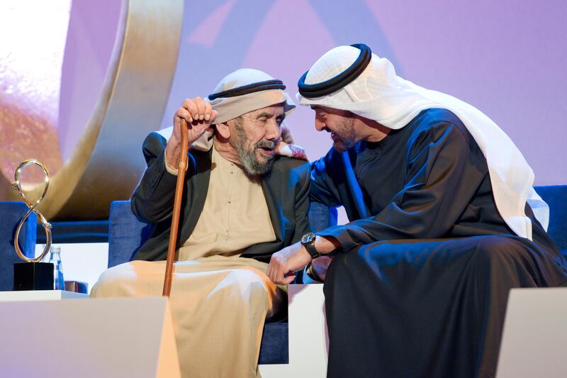 ABU DHABI, UNITED ARAB EMIRATES - January 24, 2012: (right) HH General Sheikh Mohamed bin Zayed Al Nahyan Crown Prince of Abu Dhabi Deputy Supreme Commander of the UAE Armed Forces, presents a 2011 Abu Dhabi Award to (left) Aqeeda Al Mheiri.
( Ryan Carter / Crown Prince Court - Abu Dhabi )