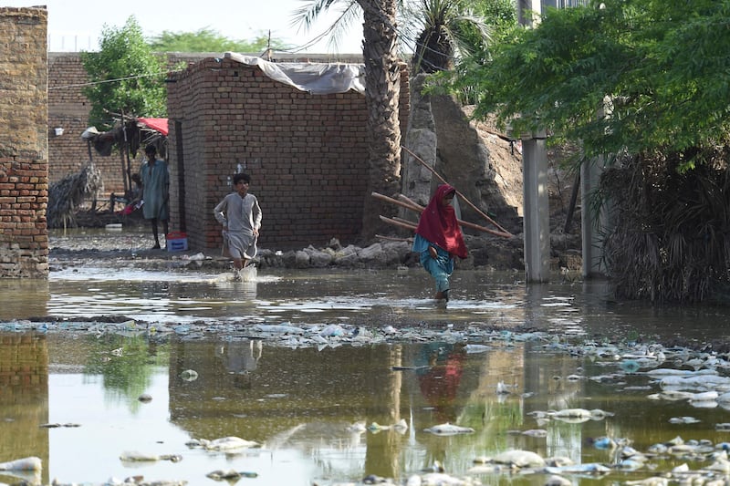 Flood waters at Panjal Shaikh village on the outskirts of Sukkur in Sindh province, Pakistan.  AFP