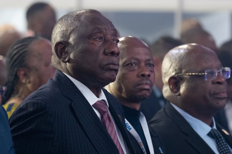 South African President and ANC leader Cyril Ramaphosa, left, attends the official announcement of election results in Johannesburg on Sunday. Getty Images