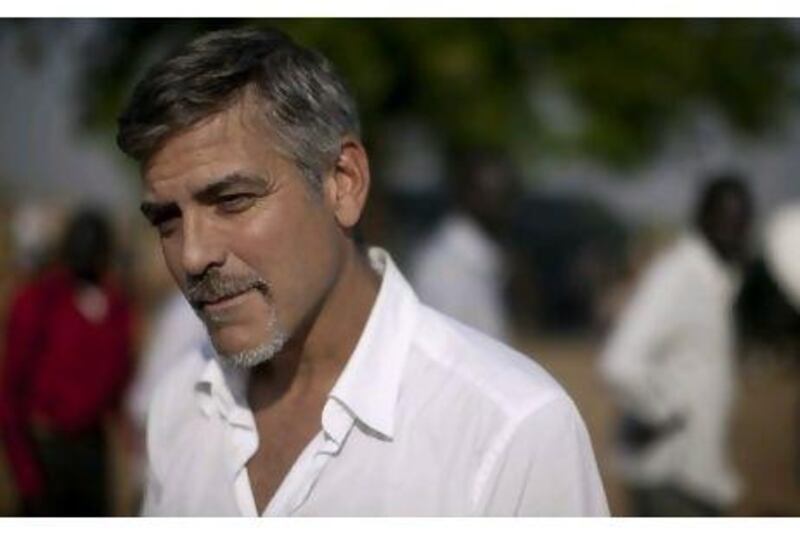 The actor George Clooney outside a polling station on the first day of voting in the southern Sudanese capital of Juba.