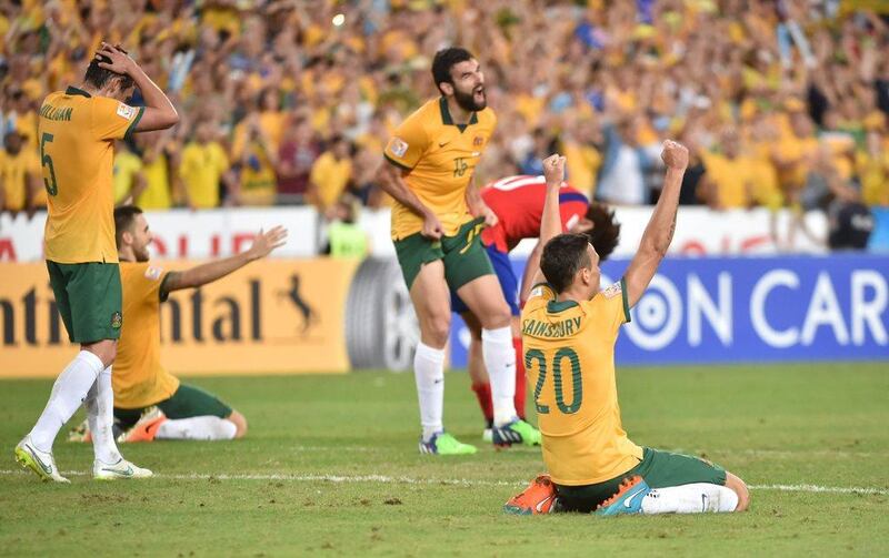 Australia players celebrate winning the Asian Cup after a nail-biting final against South Korea. Peter Parks / AFP