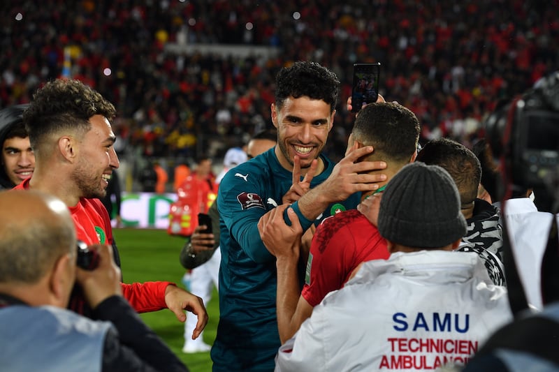 Morocco's Munir Mohand Mohamedi and Achraf Hakimi celebrate qualification for the Qatar World Cup after their 4-1 play-off win over DR Congo in Casablanca on March 29, 2022. The result gave Morocco a 5-2 aggregate victory. EPA