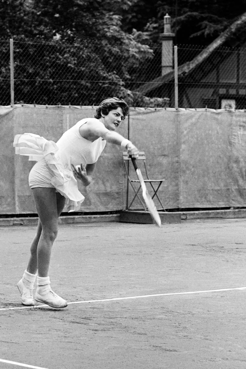 Australian tennis player Margaret Smith smashes to her opponent during a match of the French Tennis Open on June 02, 1962 at Paris. Smith won the French Tennis Open five times in 1962, 1964, 1969, 1970 and 1973. (Photo by - / AFP)