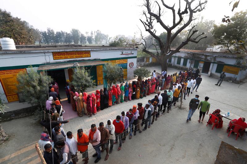 Indians queue to cast their vote during the fifth phase of Uttar Pradesh state legislature elections. AP