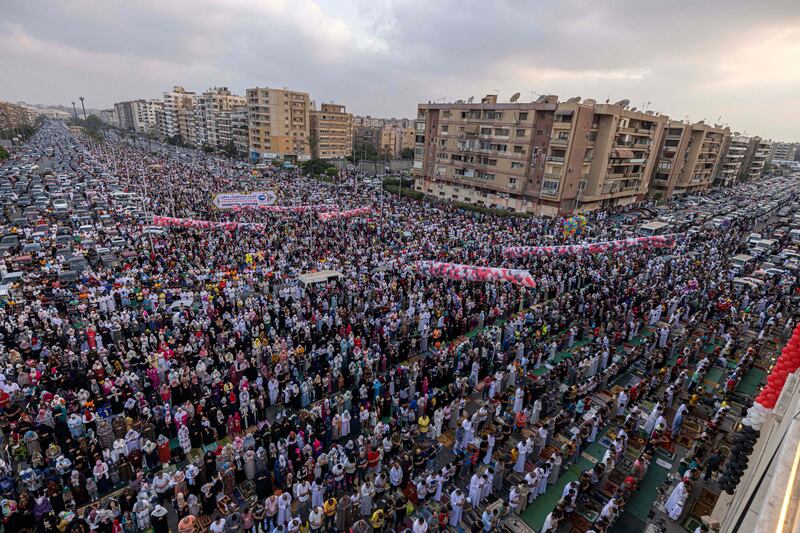 In Cairo, thousands of Muslims gather to pray as the Eid Al Adha holiday begins. AFP