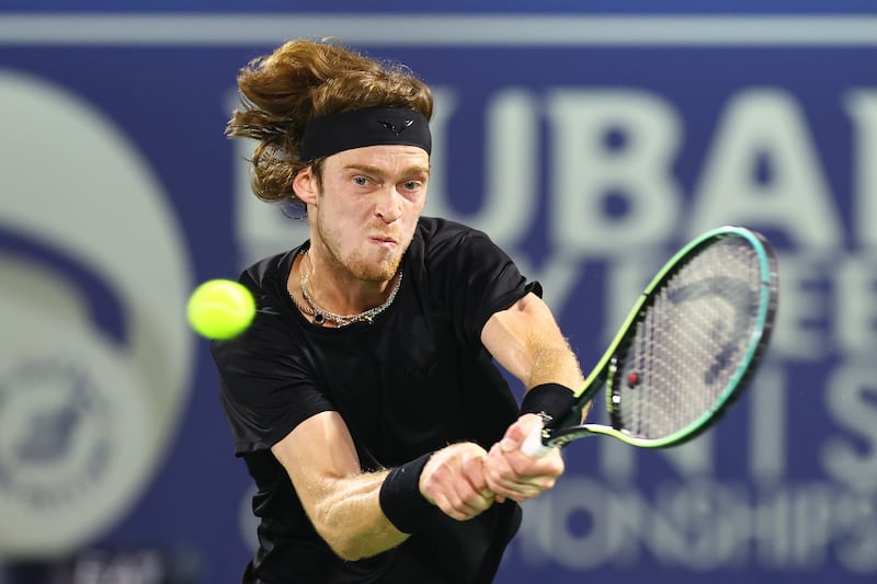 Andrey Rublev plays a backhand in the Dubai final. Getty