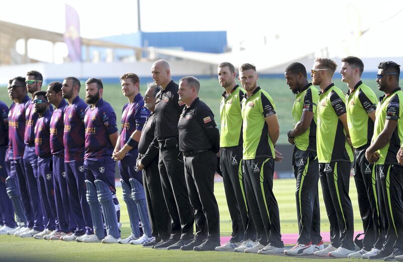 ABU DHABI , UNITED ARAB EMIRATES , Nov 19 – 2019 :- Players of Qalanders ( right ) and  Deccan Gladiators (left) observing a minute of silence in memory of  Late Sheikh Sultan bin Zayed Al Nahyan before the start of  Abu Dhabi T10 Cricket match between Qalanders vs Deccan Gladiators at Sheikh Zayed Cricket Stadium in Abu Dhabi. ( Pawan Singh / The National )  For Sports. Story by Paul