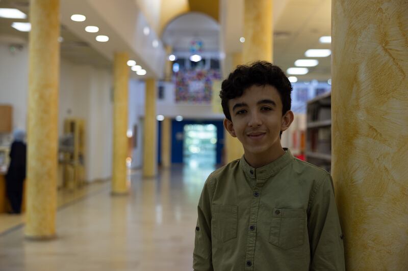 Poet Haidar Alghazali, 17, at Al-Qattan Cultural Centre, Gaza, where he works on his verses with his mentor.