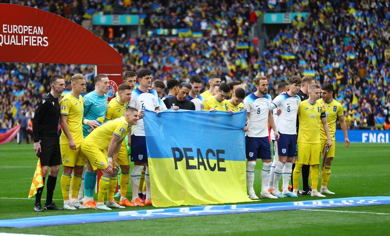 England and Ukraine players before the match. Reuters