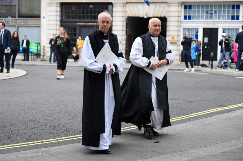 The Archbishop of Canterbury, left, arrives at St James's Palace in London for the Accession Council ceremony. Bloomberg