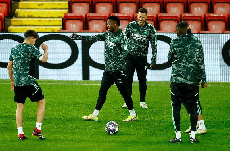 Real Madrid's Eden Hazard and Vinicius Junior during training. Reuters