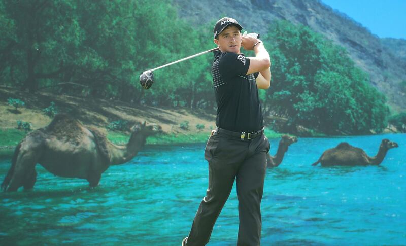 Paul Dunne of Ireland tees off on the 15th hole during the second round of the Oman Open at Al Mouj Golf in Muscat. Getty Images