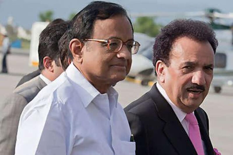 New talks will concentrate on building trust. Above, Palaniappan Chidambaram, India's home minister, with Rehman Malik, Pakistan's interior minister, in Rawalpindi last month.
