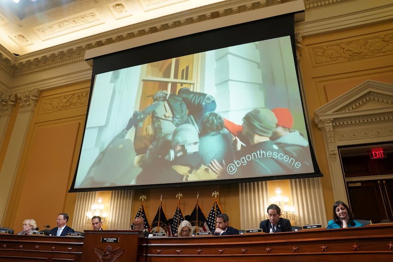 A monitor shows video footage of the January 6 attack on the US Capitol, during Thursday's public hearing. EPA