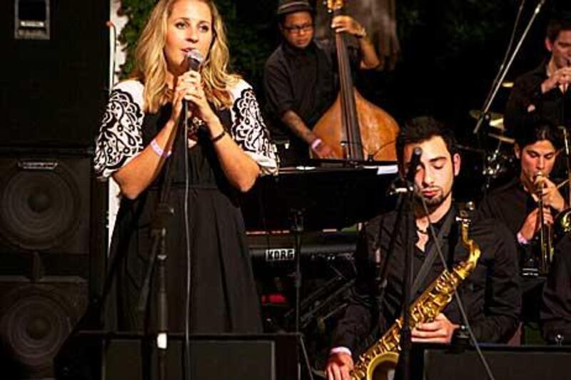 Sinead Keane, a singer in the Abu Dhabi Big Band, performs at One to One Hotel last night.