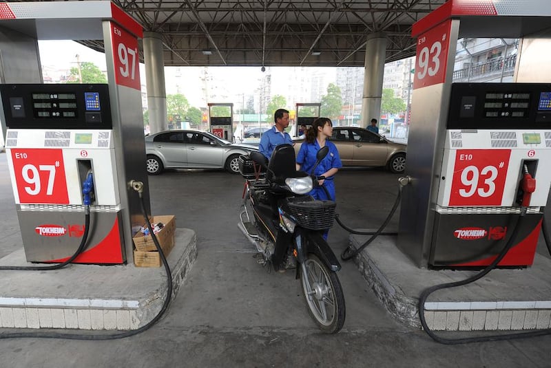 China may be using more oil than thought. Above, a petrol station in Hefei, China. AFP