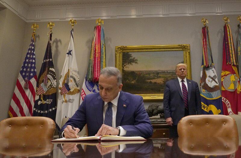 US President Donald Trump receives Iraq's Prime Minister Mustafa Al Kadhimi in the Oval Office at the White House in Washington, August 20, 2020.  Reuters