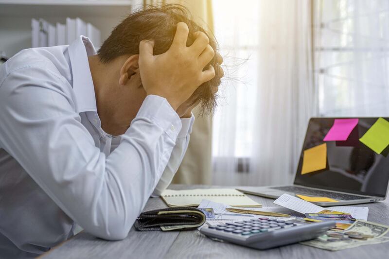 Business people stress the cost. Getty Images