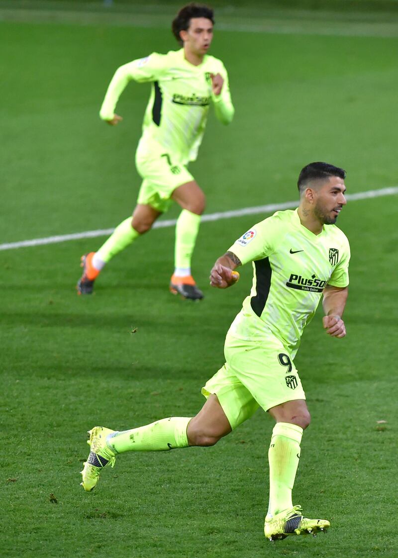 Atletico's Luis Suarez celebrates his opener. AFP