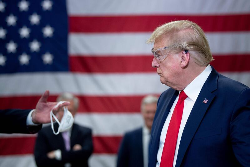 US President Donald Trump tours a Honeywell International Inc. factory producing N95 masks in Phoenix, Arizona.  AFP