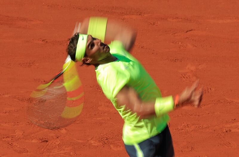 Nadal serves during the match. Reuters
