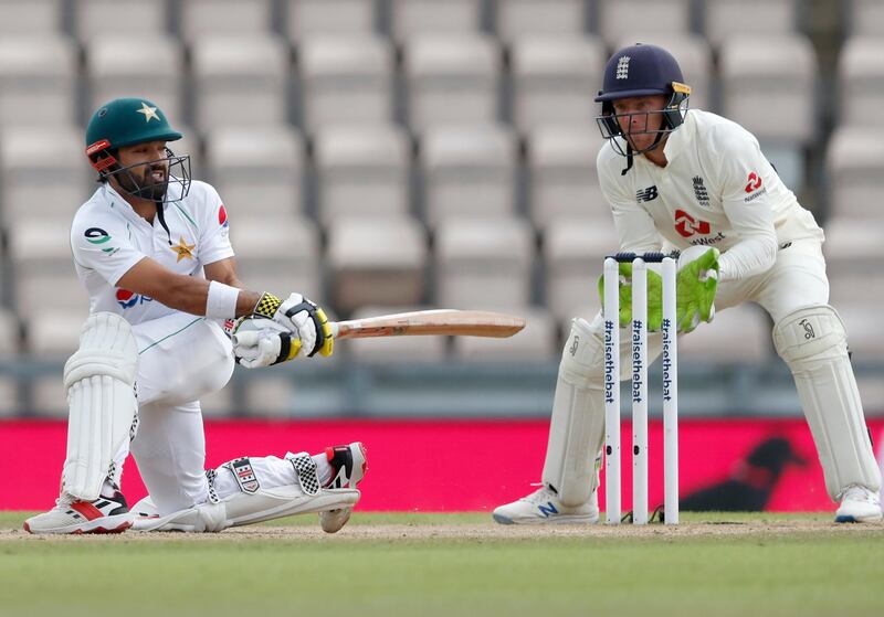 Pakistan's Mohammad Rizwan, let, plays a shot during the third day of the third Test. AP
