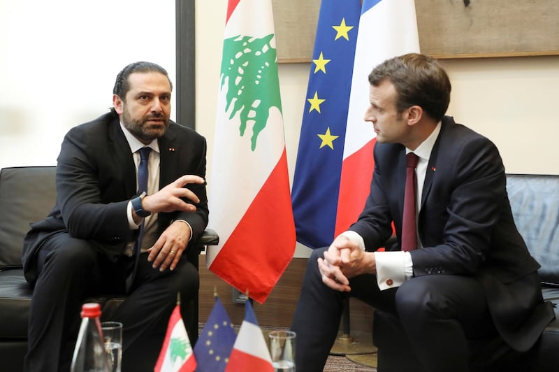 Lebanese Prime Minister Saad Hariri, left, speaks with French President Emmanuel Macron as they attend the international CEDRE conference in Paris Friday, April 6, 2018.International donors are set to give the green light to a $10-billion investment plan for Lebanon at the conference in Paris, hoping to stave off an economic crisis. Lebanon's economic growth has plummeted due to repeated political crises, compounded by the Syrian war which has sent a million refugees across the border -- equivalent to a quarter of the Lebanese population before the conflict. (Ludovic Marin / pool photo via AP)